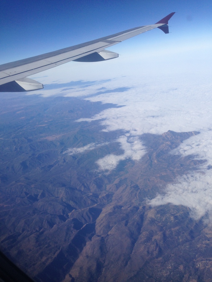 Clouds over barren Mexican territory.