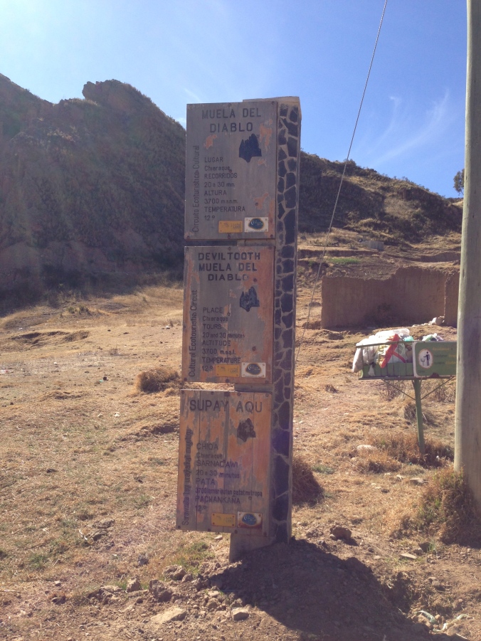 This sign welcomes passersby to La Muela del Diablo in English, Spanish, and Aymara, one of the two dominant indigenous languages used in Bolivia. 