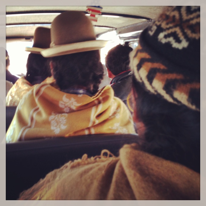 View from the back of the minibus, triple-threat Cholitas. 
